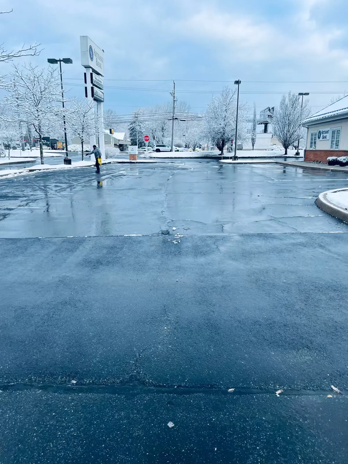 A commercial parking lot cleared and treated after a Delaware snowstorm.